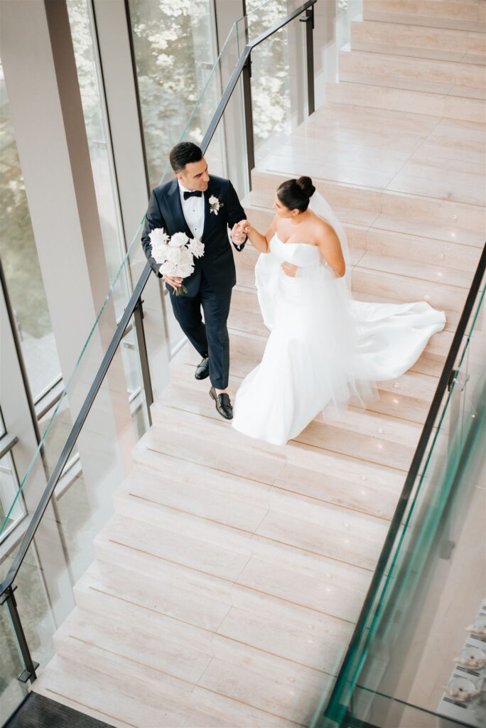 Bride and groom at the Leslie & Anna Dan Galleria and Atrium in the Royal Conservatory of Music in Toronto.