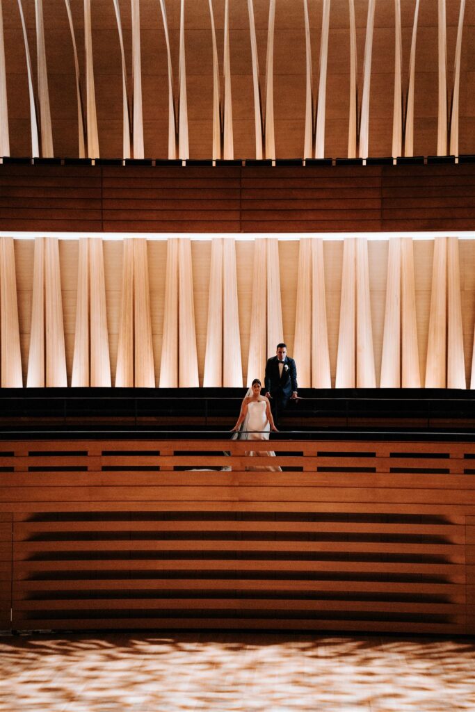 Bride and groom wedding portraits at  Koerner Hall in Toronto.