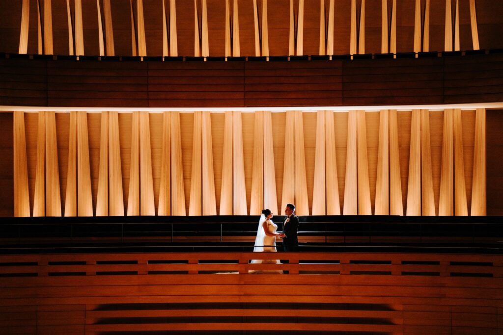 Bride and groom wedding portraits at  Koerner Hall in the Royal Conservatory of Music in Toronto.
